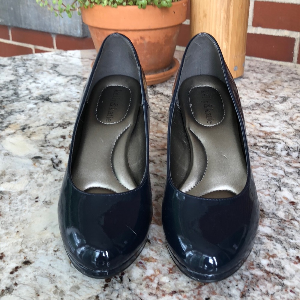Navy blue patent leather pumps brand new!